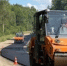 Новый асфальт раскатывают на важной загородной трассе в Марий Эл - Pg12.Ru